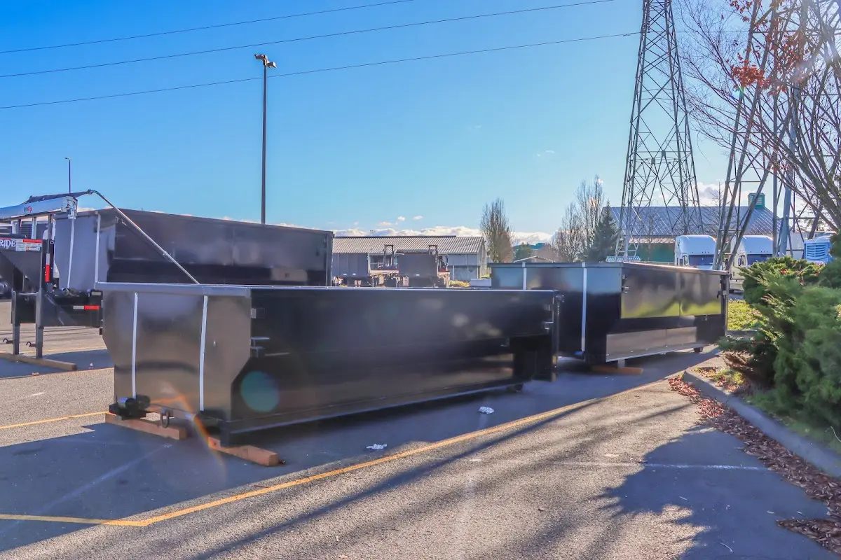 Roll-off dumpster ready for waste disposal at job site for Commercial Dumpster Rental in Owosso